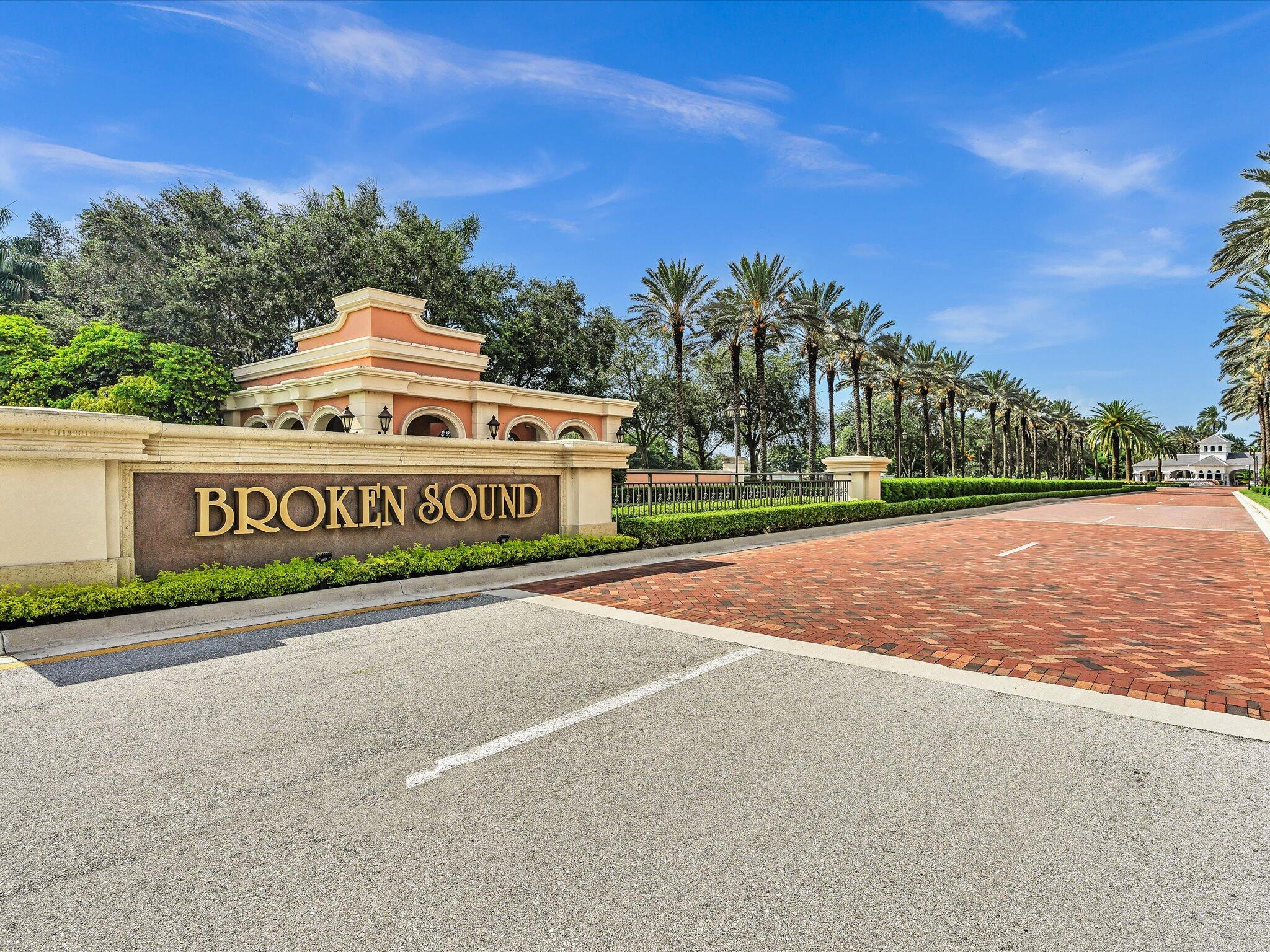 2486 Northwest 66th Drive Boca Raton, FL 33496 - Photo 40 of 80 a view of a street with a building in the background