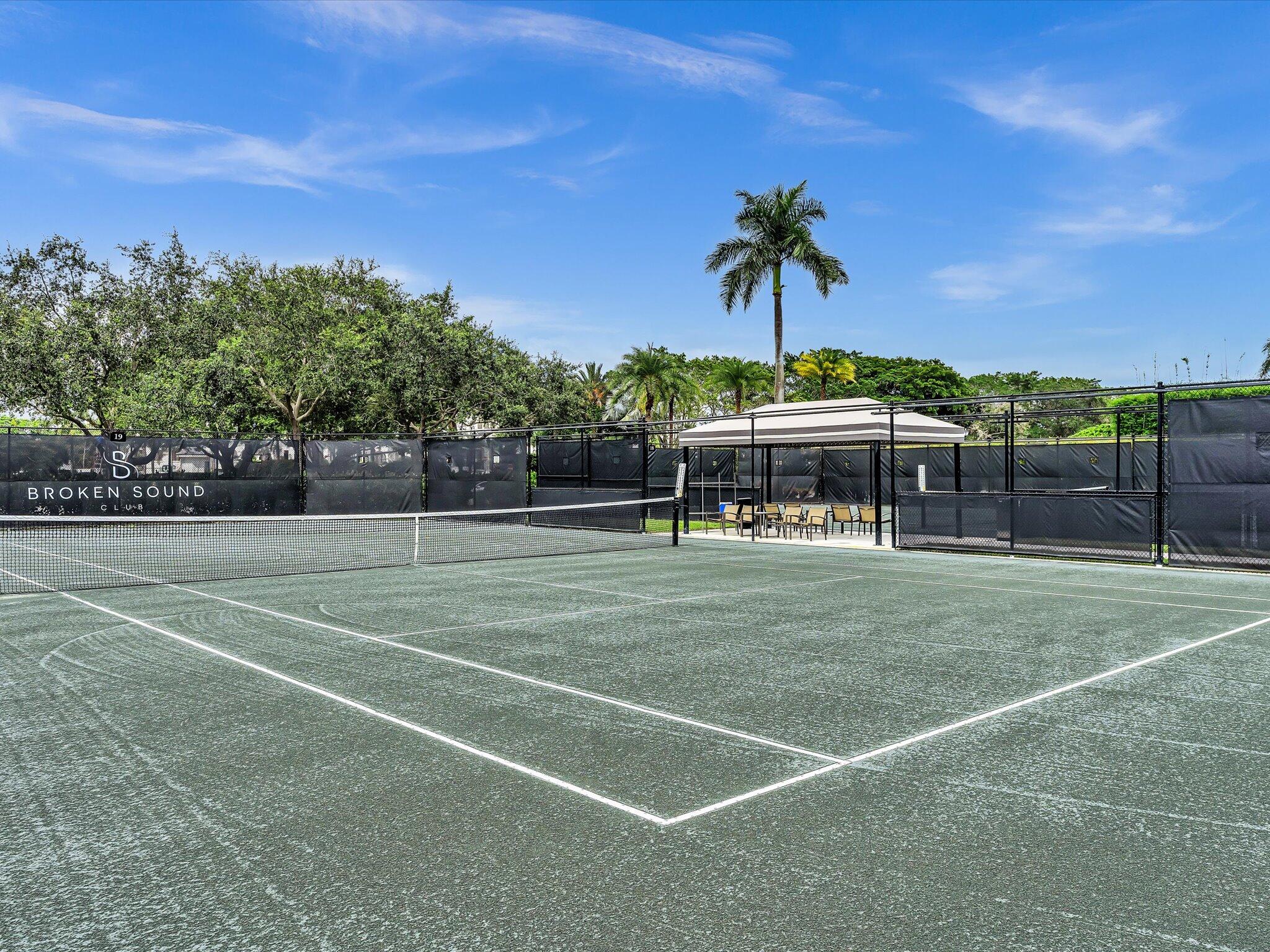 2486 Northwest 66th Drive Boca Raton, FL 33496 - Photo 46 of 80 a view of a tennis court