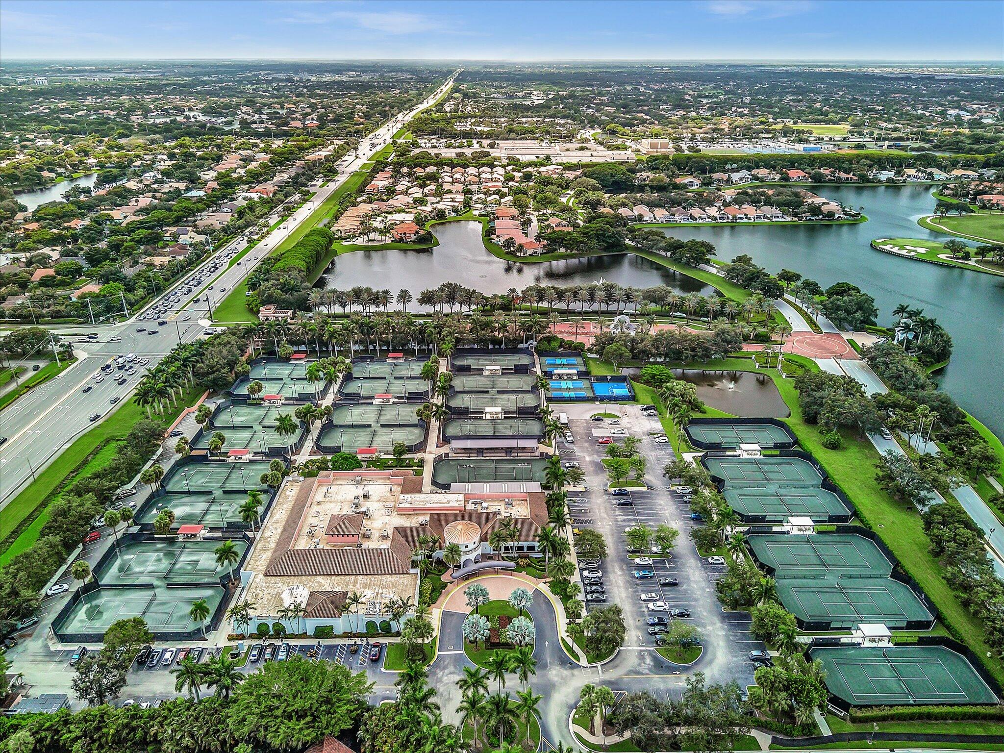 2486 Northwest 66th Drive Boca Raton, FL 33496 - Photo 53 of 80 an aerial view of residential houses with outdoor space