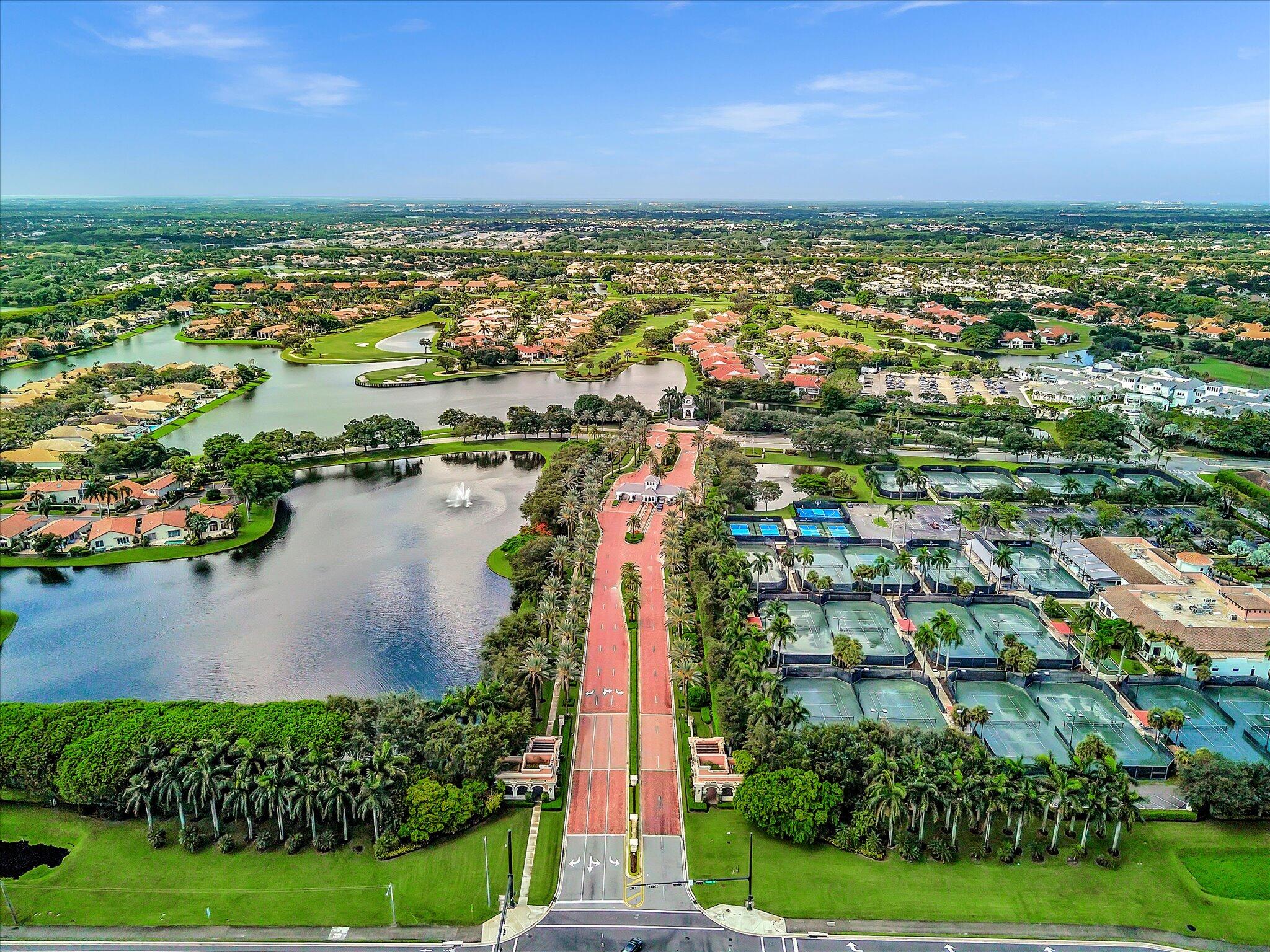 2486 Northwest 66th Drive Boca Raton, FL 33496 - Photo 67 of 80 an aerial view of residential houses with outdoor space and lake view