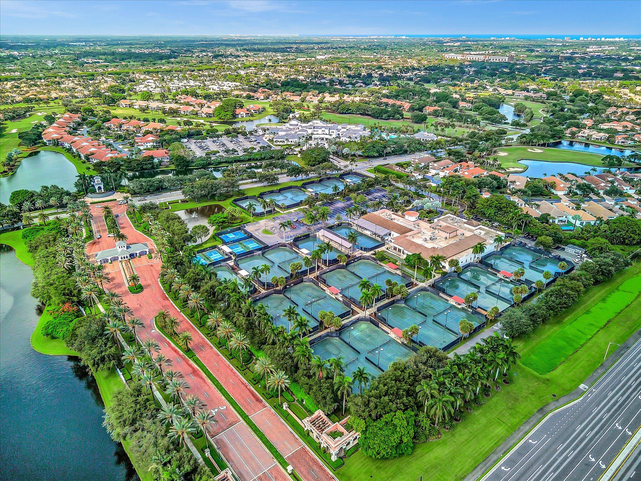 2486 Northwest 66th Drive Boca Raton, FL 33496 - Photo 68 of 80 an aerial view of residential houses with outdoor space and street view