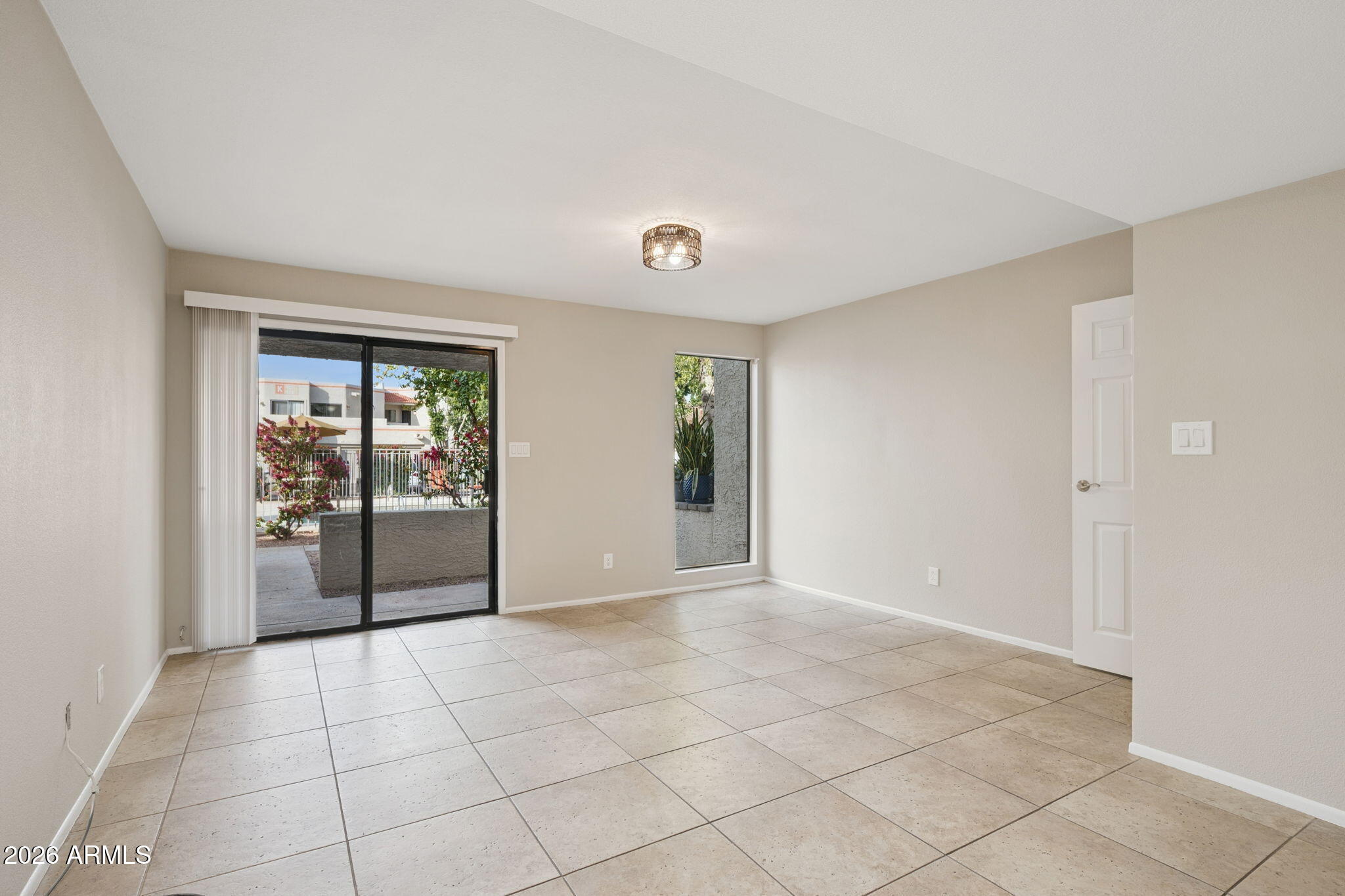935 North Granite Reef Road, Unit 89 Scottsdale, AZ 85257 - Photo 1 of 32 a view of an empty room and window