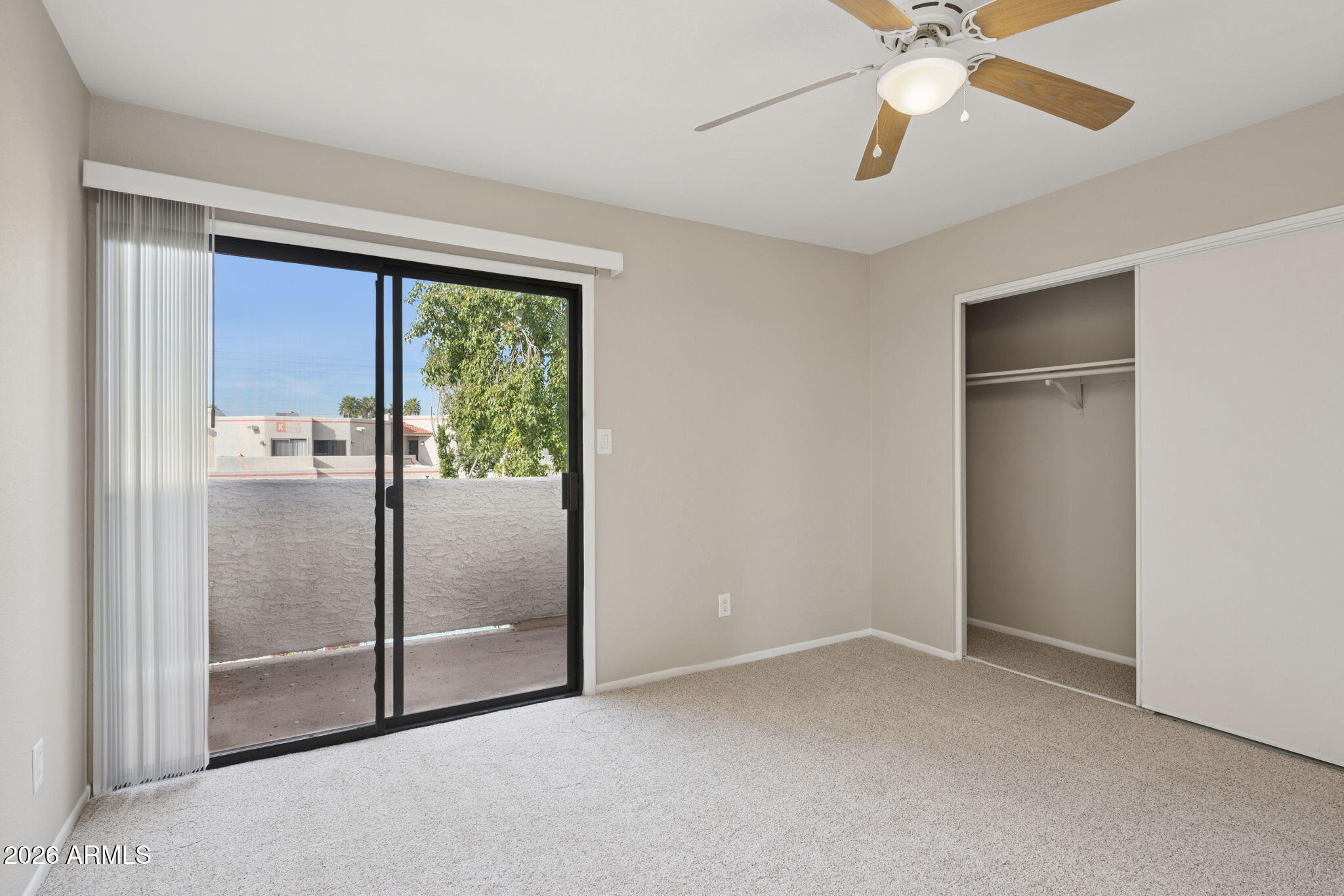 935 North Granite Reef Road, Unit 89 Scottsdale, AZ 85257 - Photo 13 of 32 a view of empty room with window and ceiling fan