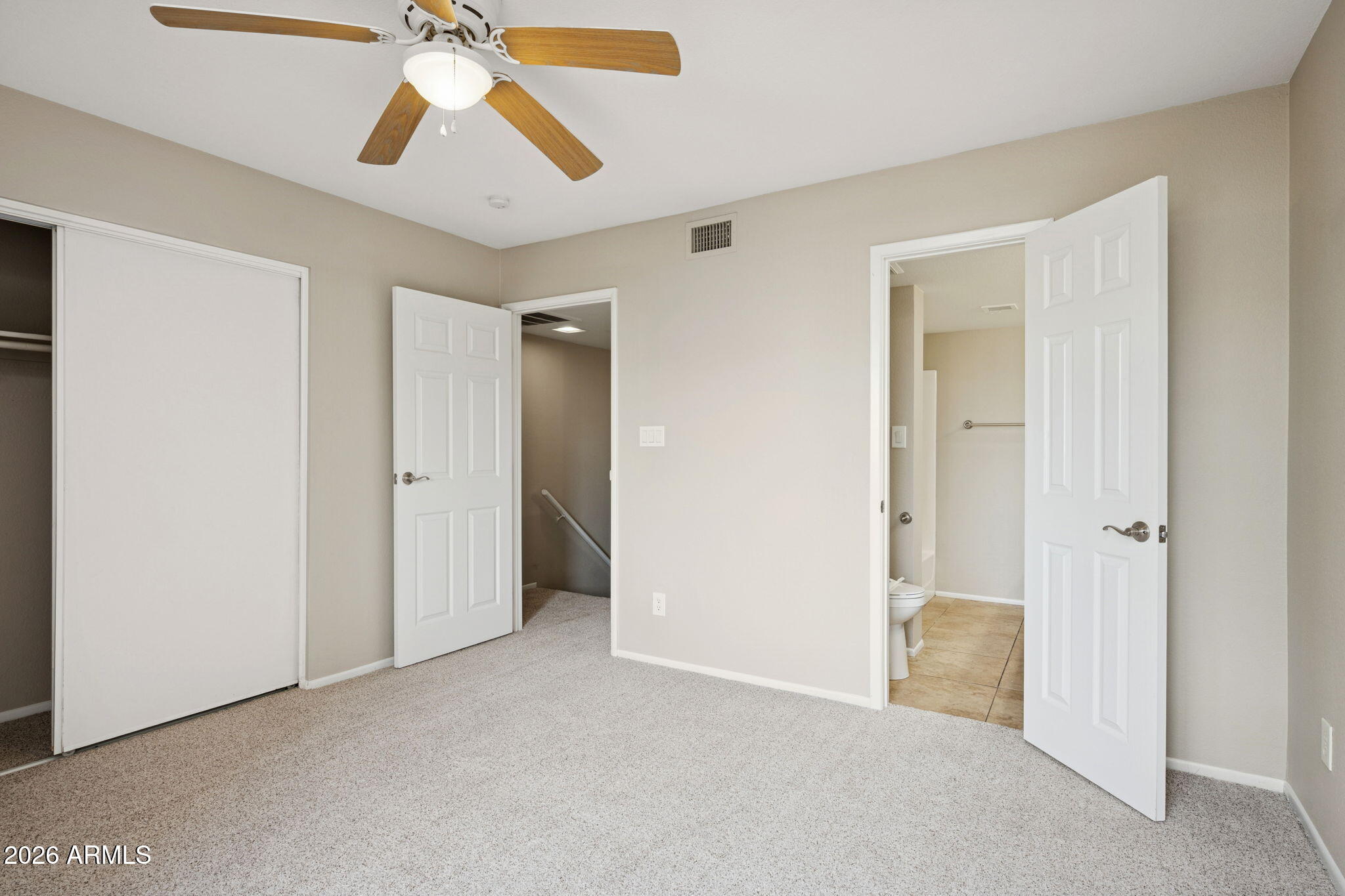 935 North Granite Reef Road, Unit 89 Scottsdale, AZ 85257 - Photo 14 of 32 a view of a room with a ceiling fan