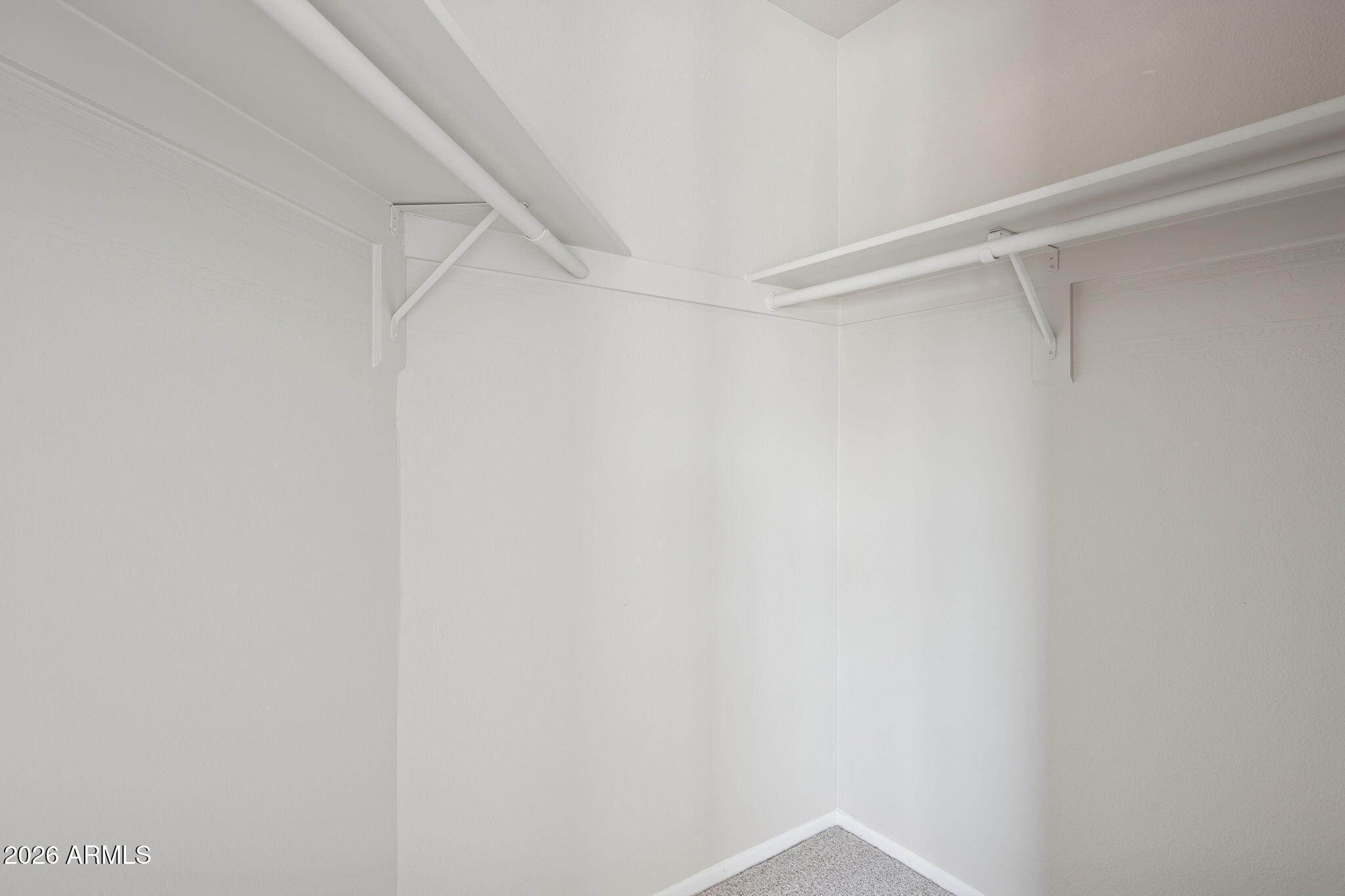 935 North Granite Reef Road, Unit 89 Scottsdale, AZ 85257 - Photo 17 of 32 a view of an empty walk in closet