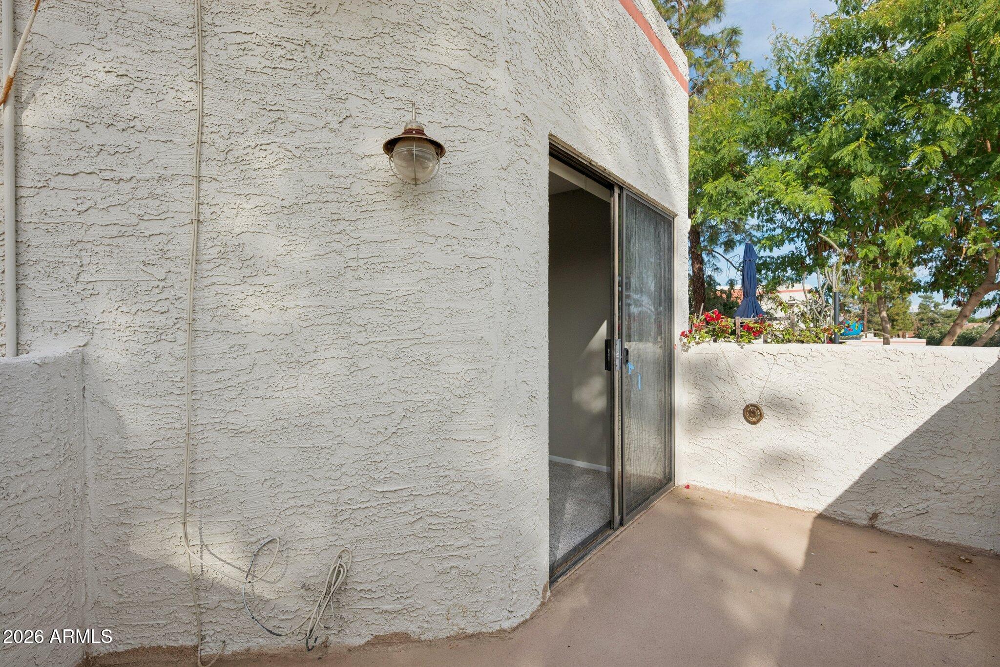 935 North Granite Reef Road, Unit 89 Scottsdale, AZ 85257 - Photo 22 of 32 a bathroom with a shower and a sink