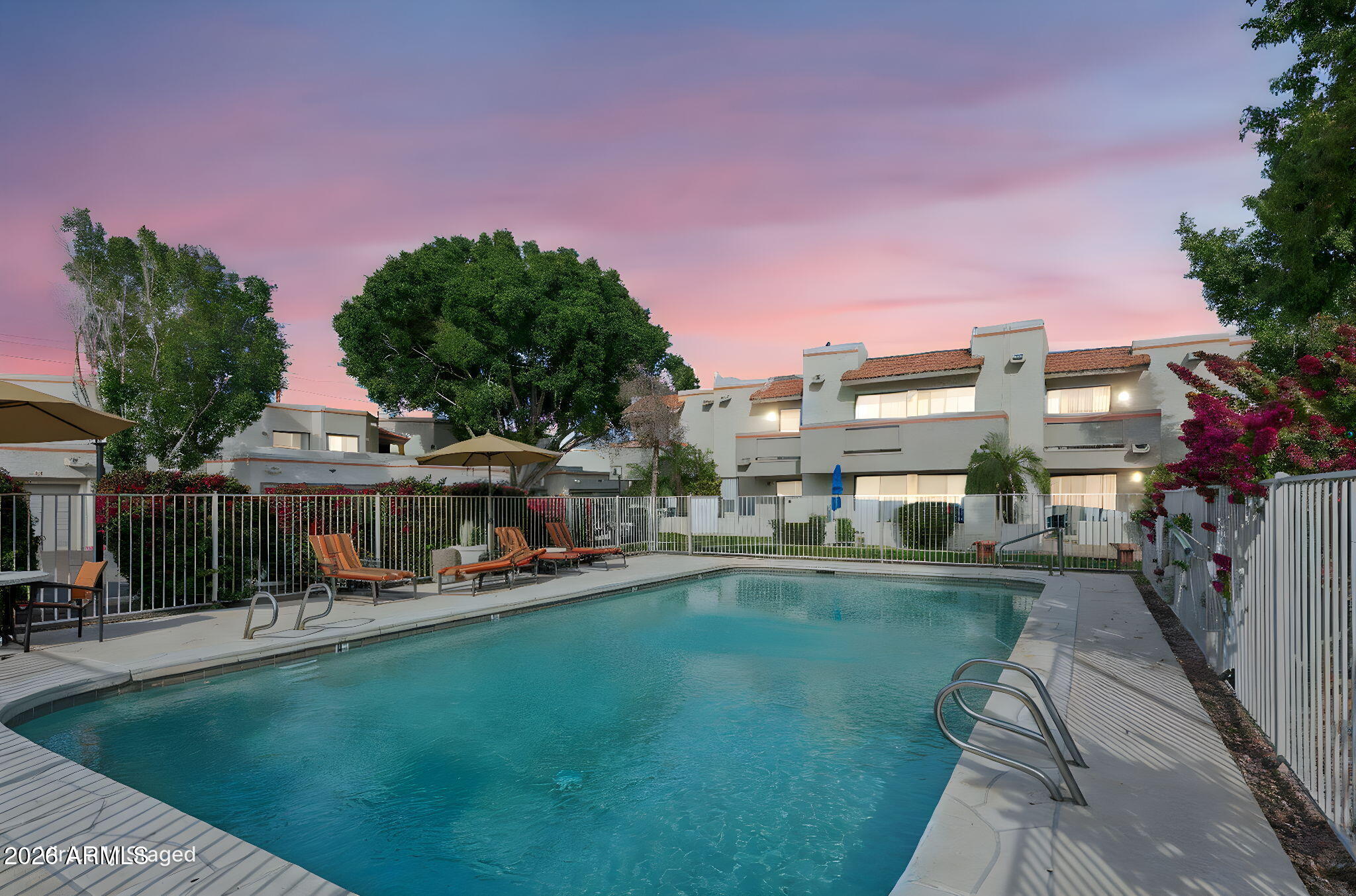 935 North Granite Reef Road, Unit 89 Scottsdale, AZ 85257 - Photo 30 of 32 a view of a house with a yard and sitting area