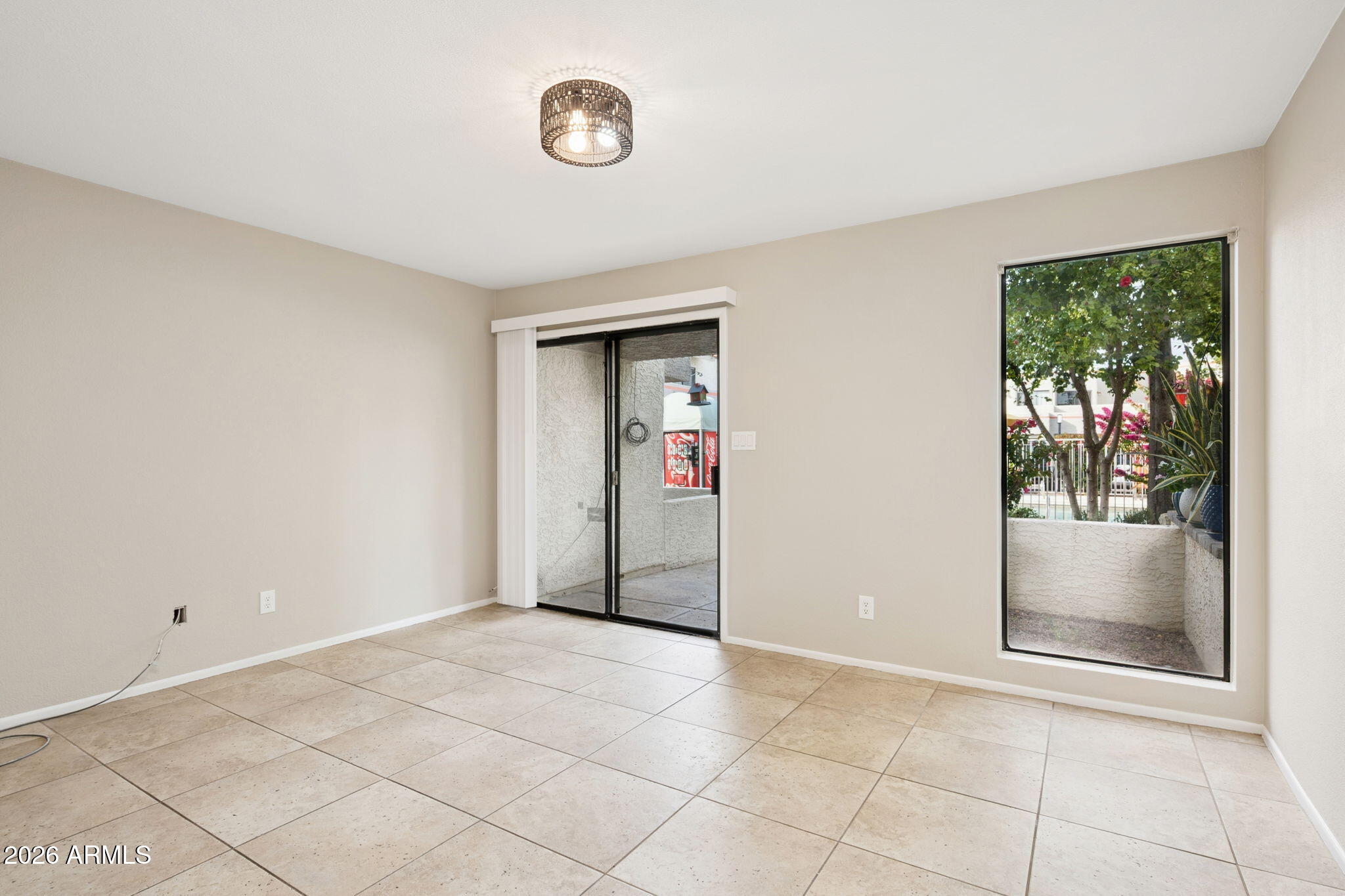 935 North Granite Reef Road, Unit 89 Scottsdale, AZ 85257 - Photo 4 of 32 a view of an empty room with a window