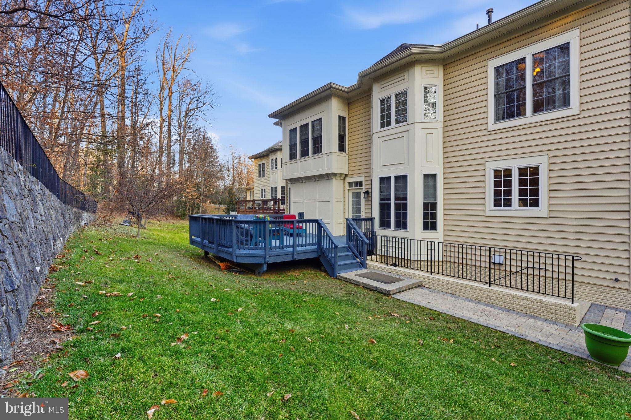 7669 Oak Field Court Springfield, VA 22153 - Photo 54 of 57 a view of a house with a yard and furniture