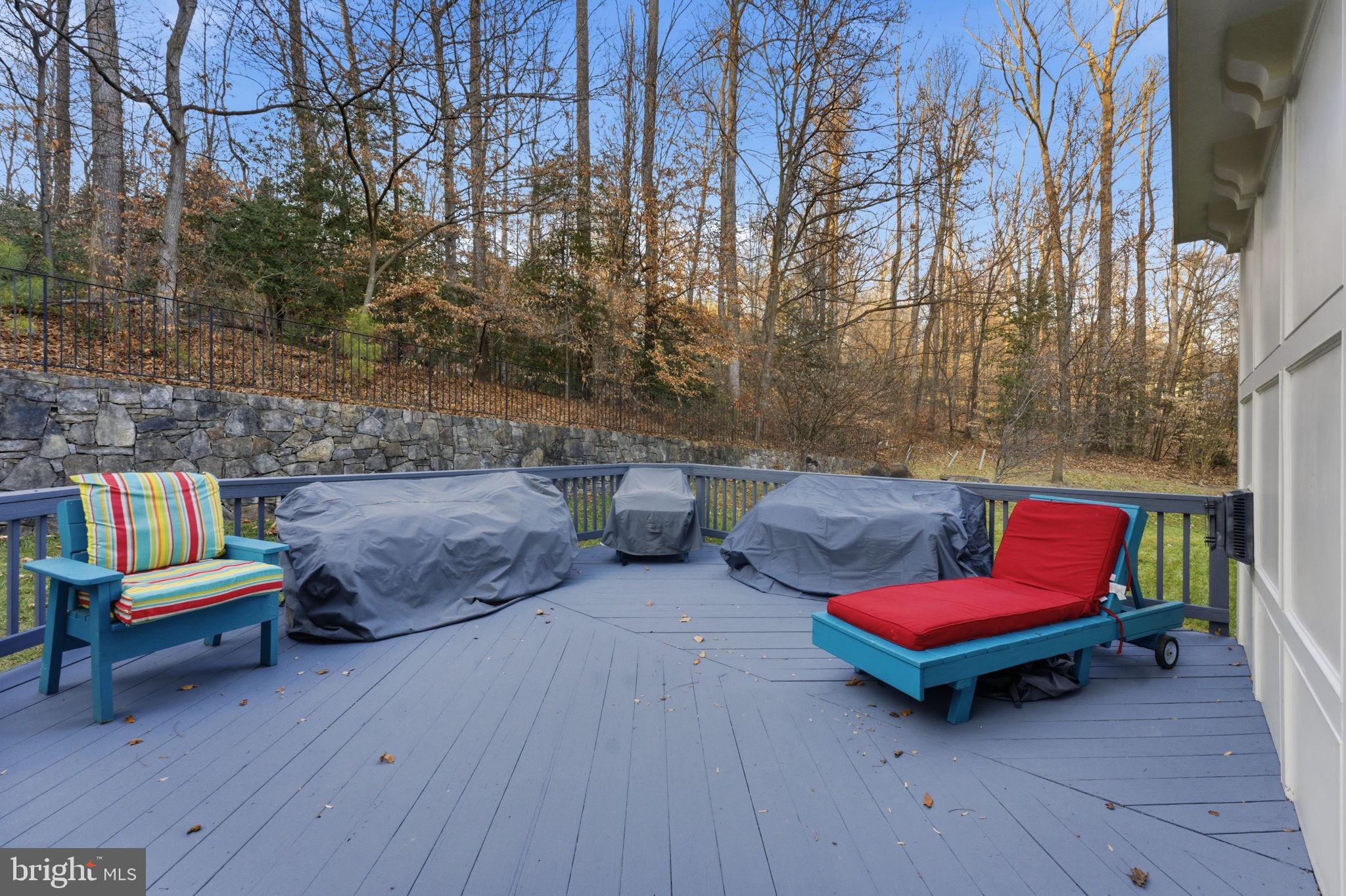 7669 Oak Field Court Springfield, VA 22153 - Photo 55 of 57 a backyard of a house with outdoor seating