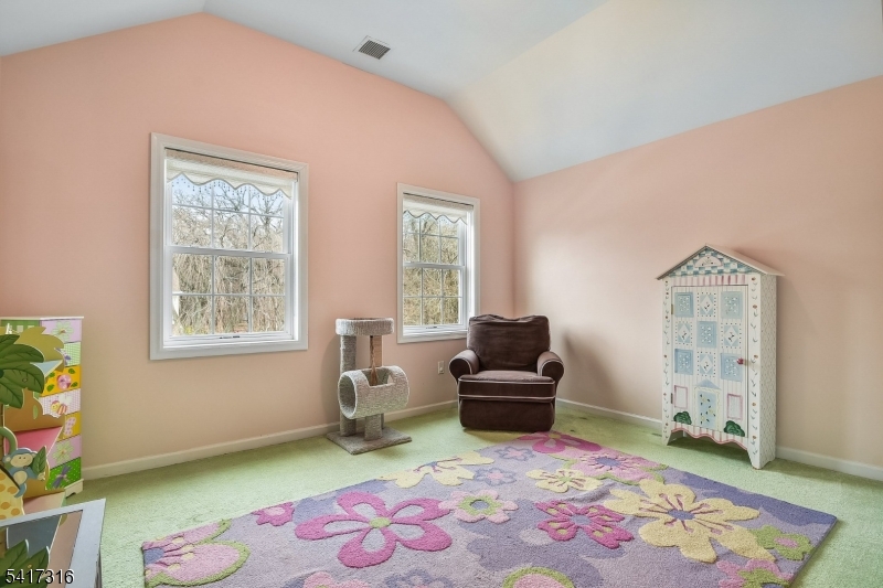 83 White Street Dover, NJ 07801 - Photo 18 of 26 a living room with furniture and a rug