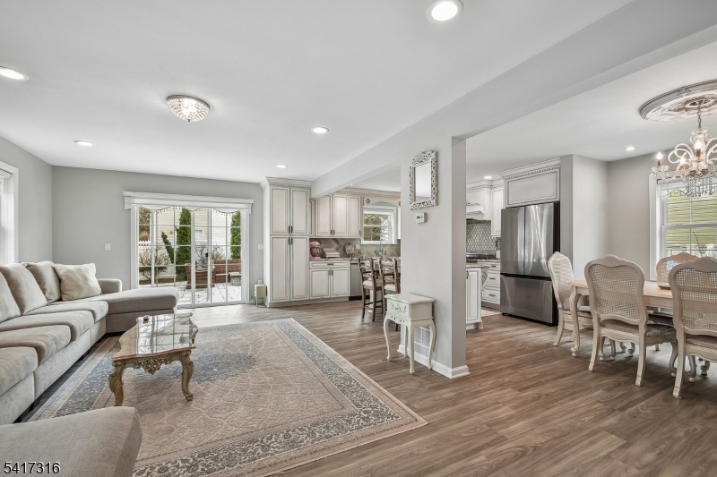 83 White Street Dover, NJ 07801 - Photo 10 of 26 a living room with furniture dining table and wooden floor