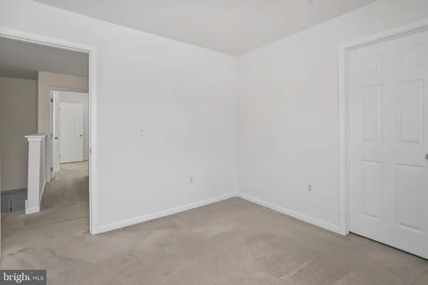 an empty room with closet