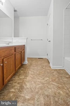 a view of a kitchen with cabinets