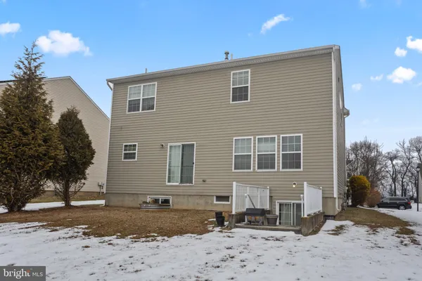 a view of a house with a snow