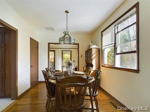 12 Old Turnpike Road Bloomingburg, NY 12721 - Photo 11 of 11 a view of a dining room with furniture window and outside view