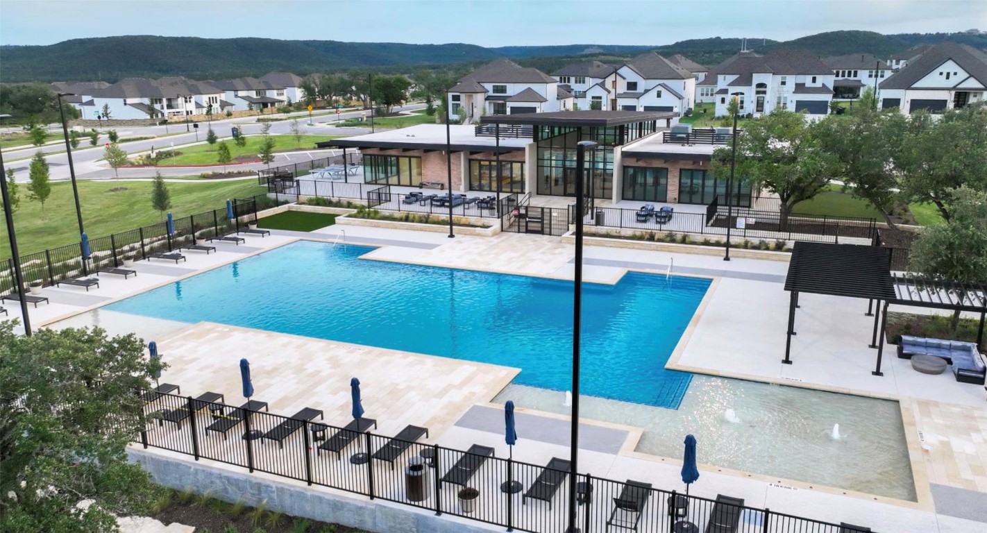 1224 Siena Sunset Road Leander, TX 78641 - Photo 26 of 28 Community pool with a patio area and a residential view