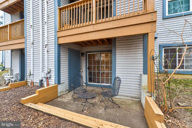 a front view of a house with a outdoor space