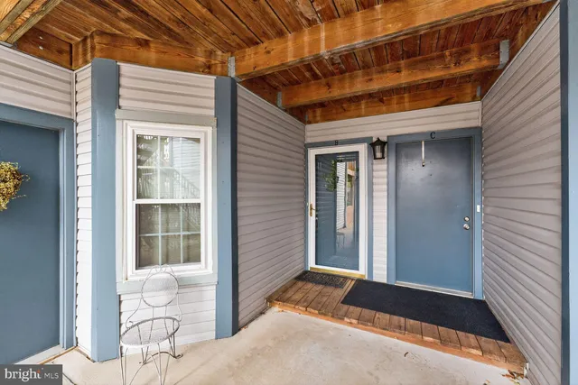 a sign on the side of a tree