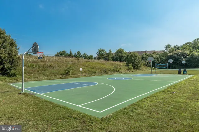 a view of swimming pool with a yard