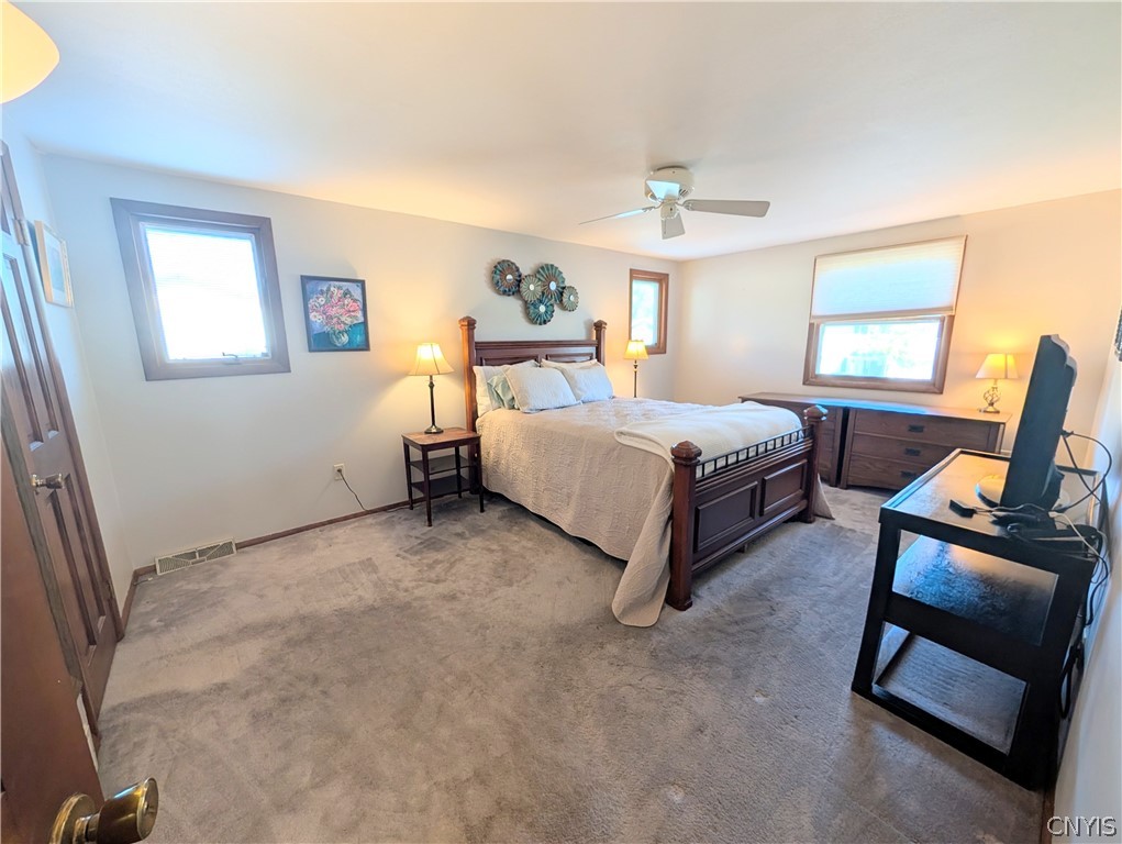 8009 Ginger Road Clay, NY 13090 - Photo 37 of 48 Primary Bedroom
