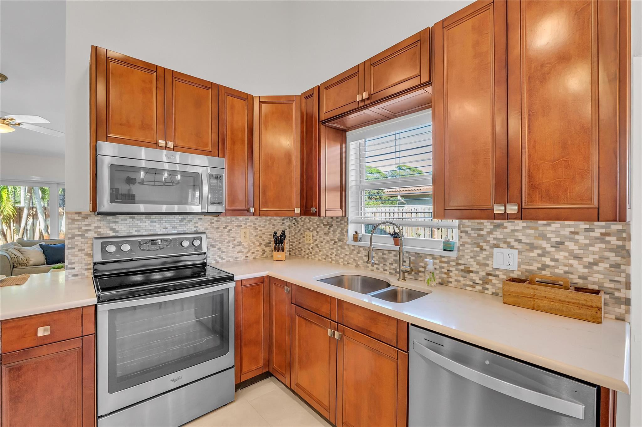 3605 Southwest 23rd Street Delray Beach, FL 33445 - Photo 4 of 50 a kitchen with a sink and cabinets