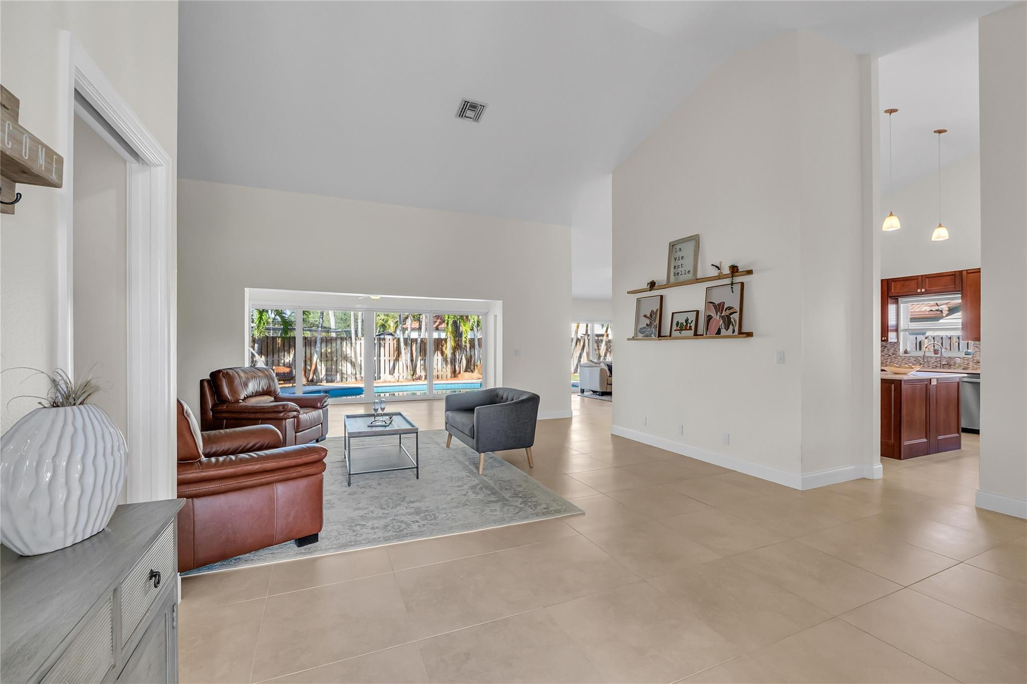 3605 Southwest 23rd Street Delray Beach, FL 33445 - Photo 8 of 50 a living room with furniture and a couch