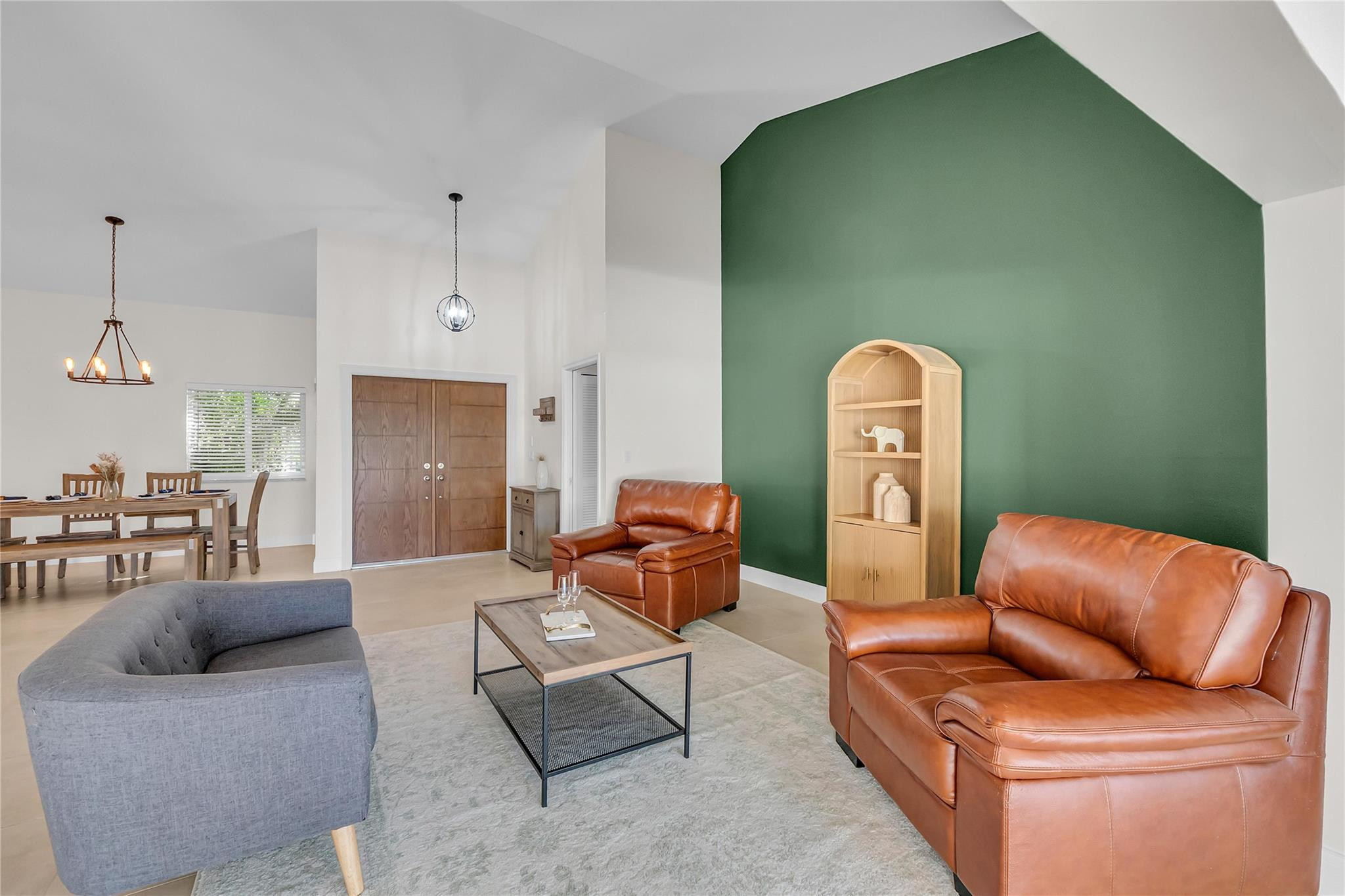 3605 Southwest 23rd Street Delray Beach, FL 33445 - Photo 10 of 50 a living room with furniture and a fireplace