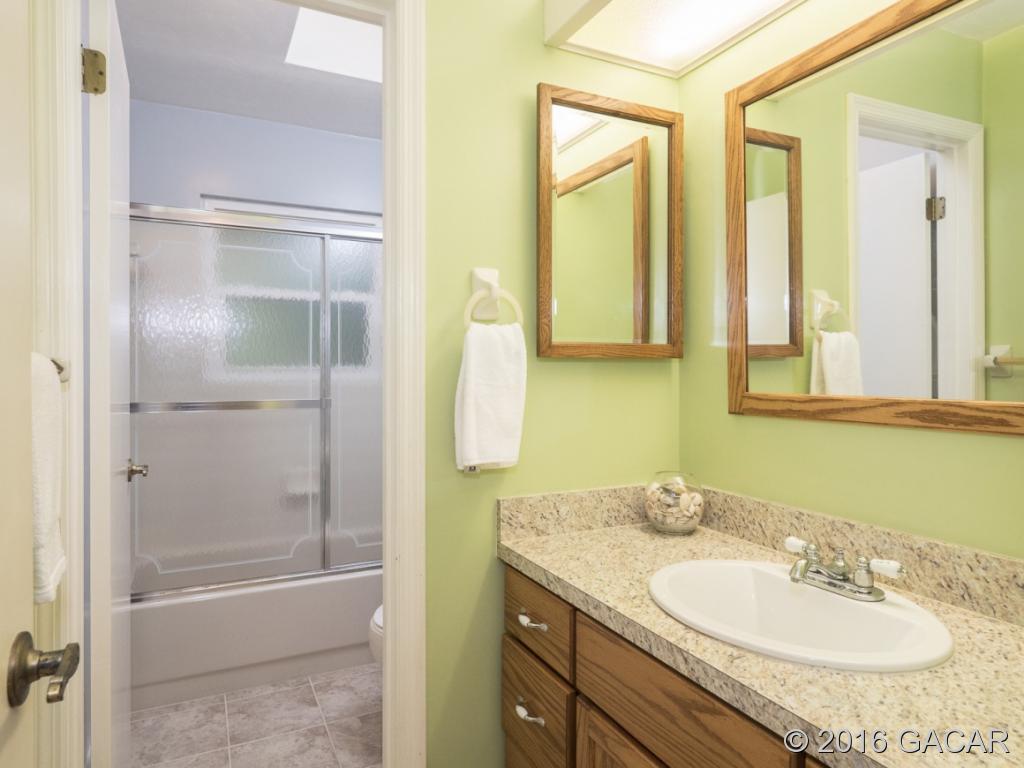 7620 Southwest 19th Place Gainesville, FL 32607 - Photo 14 of 23 Guest Bathroom