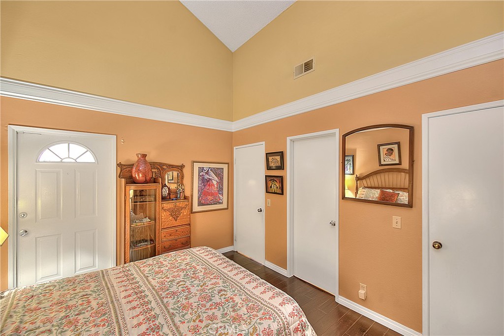 8576 Salina Street Rancho Cucamonga, CA 91730 - Photo 23 of 33 a bedroom with a bed and a walk in closet