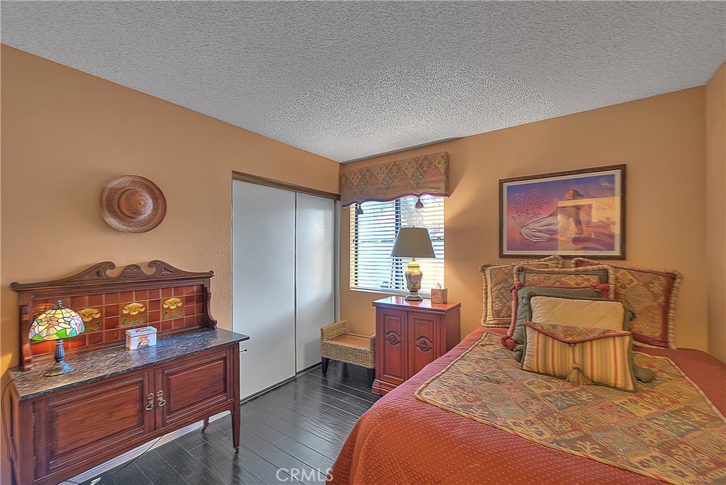 8576 Salina Street Rancho Cucamonga, CA 91730 - Photo 26 of 33 a bedroom with a bed and furniture