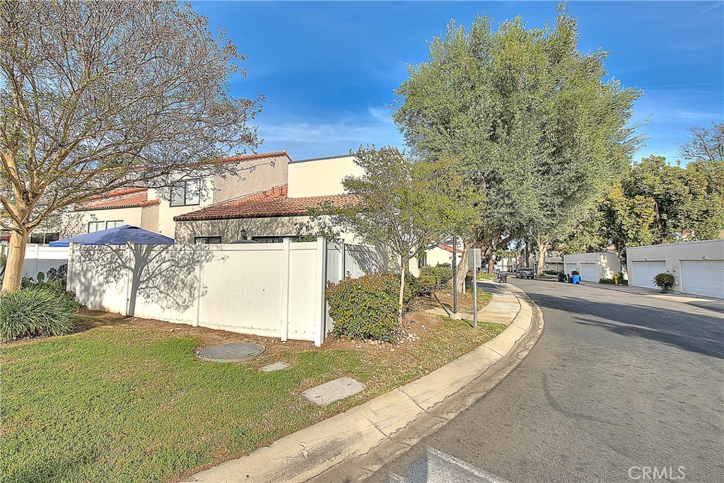 8576 Salina Street Rancho Cucamonga, CA 91730 - Photo 4 of 33 a view of a yard in front of a building