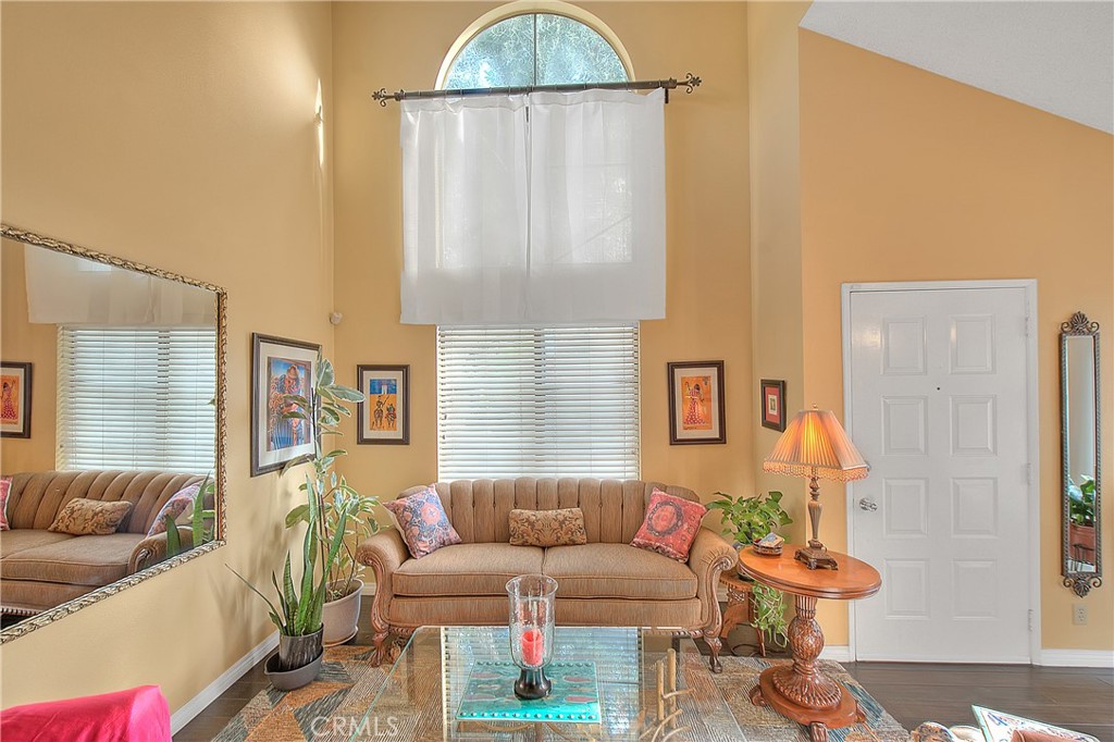 8576 Salina Street Rancho Cucamonga, CA 91730 - Photo 6 of 33 a living room with furniture and a window