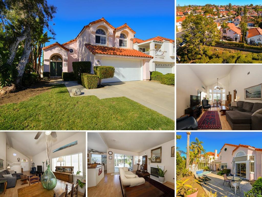a view of multiple houses with yard