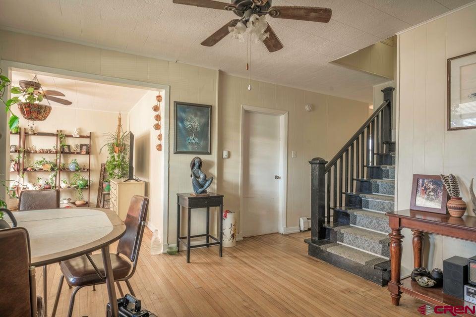 603 East First Street Trinidad, CO 81082 - Photo 20 of 37 a view of a dining room with furniture window and wooden floor
