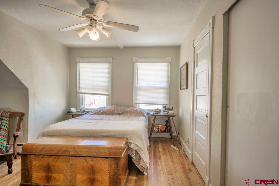 603 East First Street Trinidad, CO 81082 - Photo 2 of 37 a room with a bed and a window