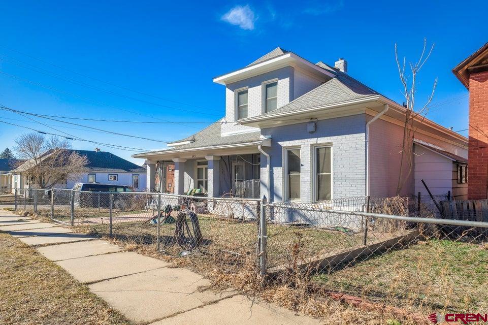 603 East First Street Trinidad, CO 81082 - Photo 21 of 37 a front view of a house with garden