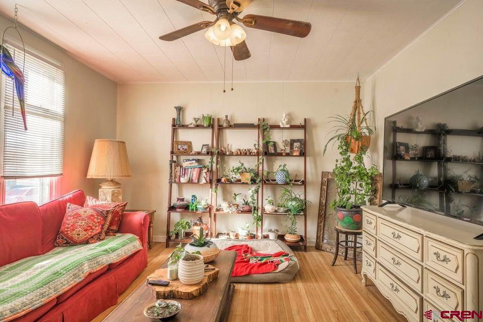 603 East First Street Trinidad, CO 81082 - Photo 23 of 37 a bedroom with furniture and a window