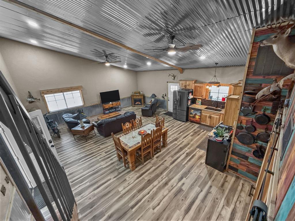 1477 Cedar Mills Road Gordonville, TX 76245 - Photo 10 of 21 view of kitchen and living area from upstairs loft