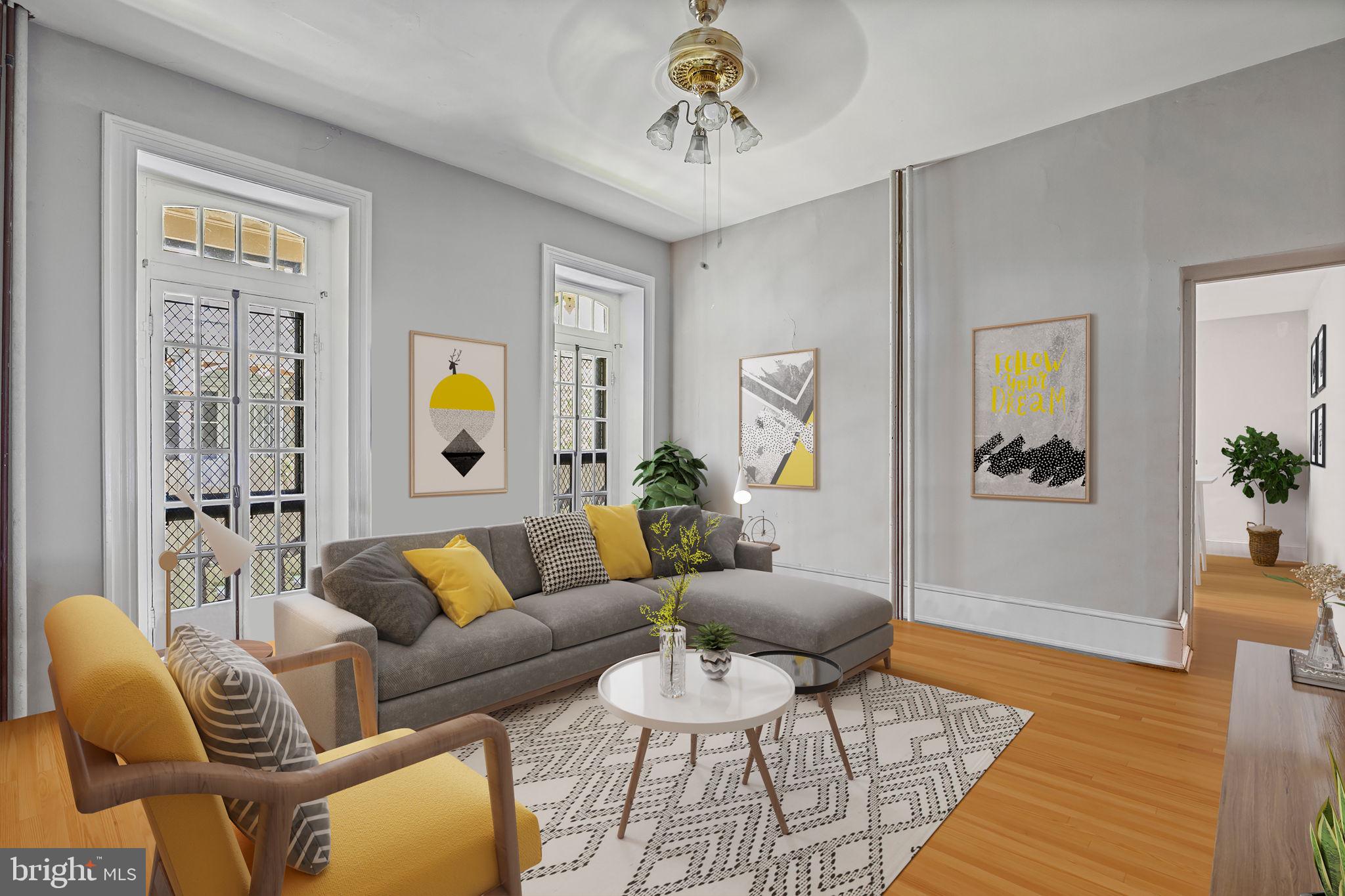 5911 Greene Street Philadelphia, PA 19144 - Photo 16 of 52 a living room with furniture and a rug