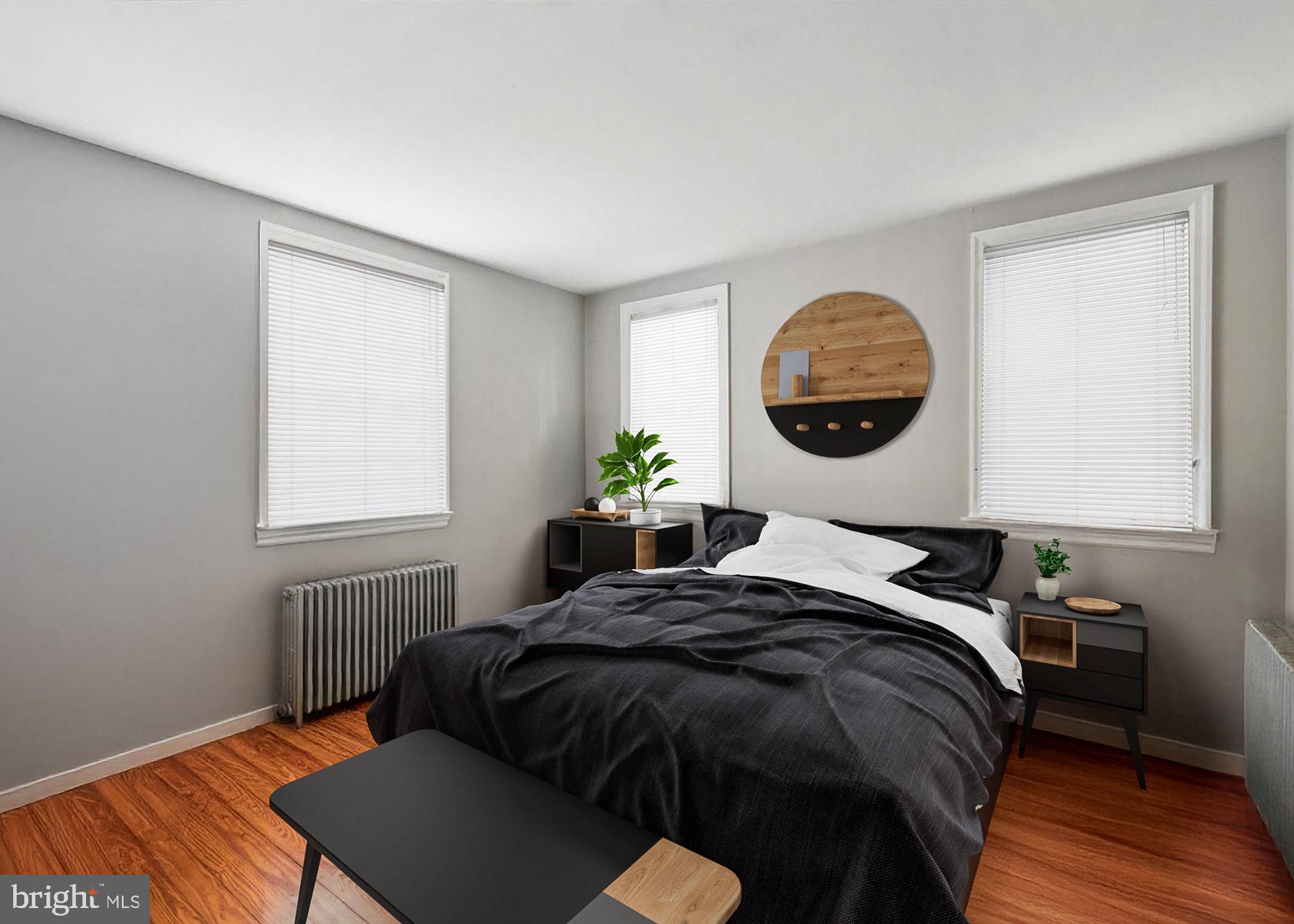 5911 Greene Street Philadelphia, PA 19144 - Photo 18 of 52 a bedroom with a bed and a window