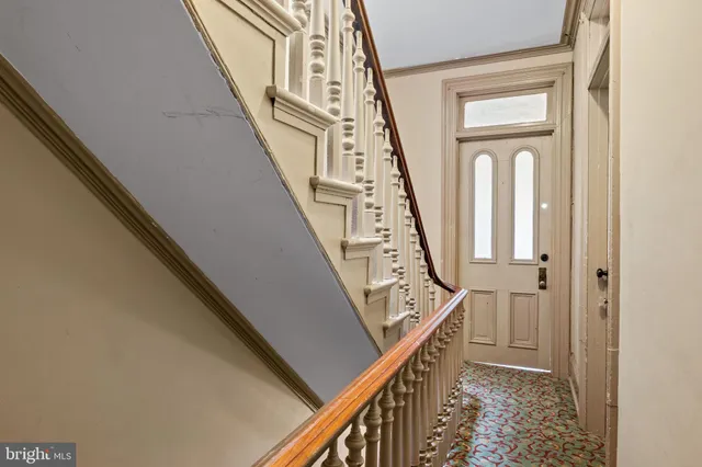 a view of an entryway with staircase