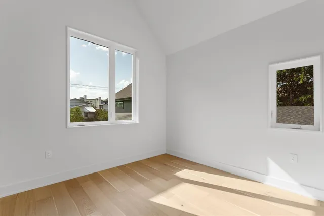 a view of an empty room and window