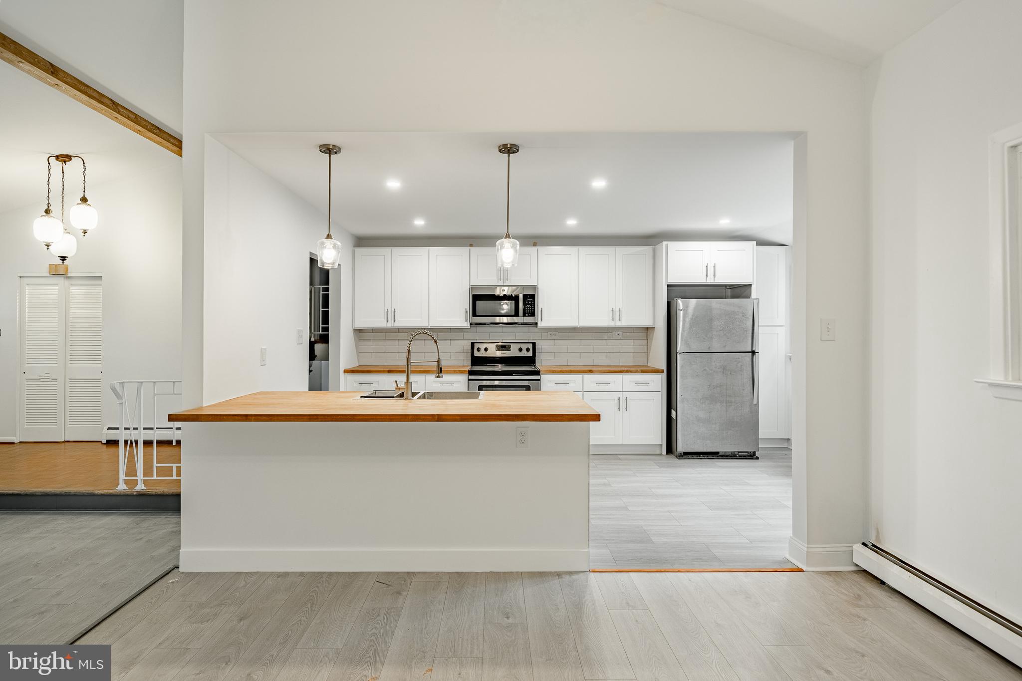 1100 West Church Road Wyncote, PA 19095 - Photo 9 of 46 Step up into large Kitchen