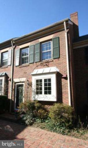 1123 Portner Road Alexandria, VA 22314 - Photo 1 of 10 a front view of a house with garden