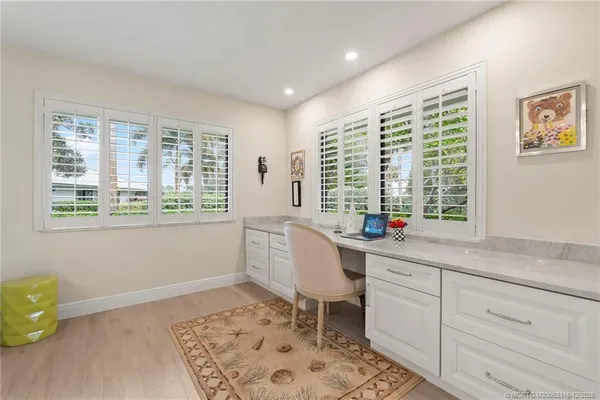 a room with a window and a table