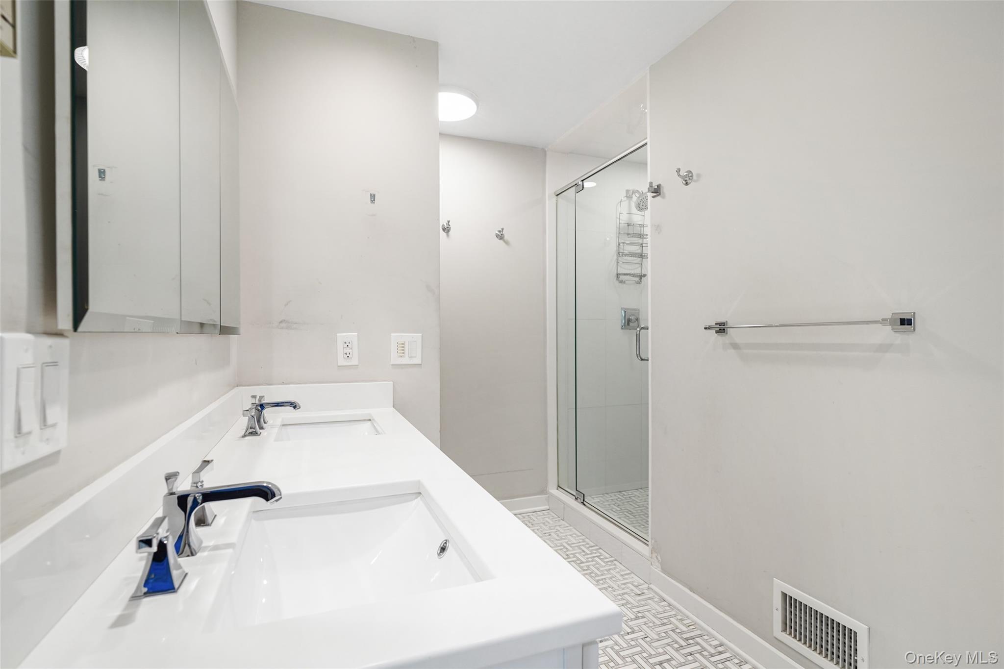 559 Pound Ridge Road Pound Ridge, NY 10576 - Photo 11 of 21 a bathroom with a sink and shower