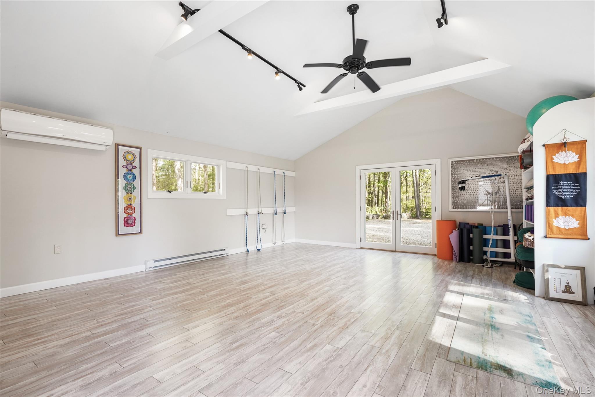 559 Pound Ridge Road Pound Ridge, NY 10576 - Photo 15 of 21 a view of livingroom with hardwood floor and a ceiling fan