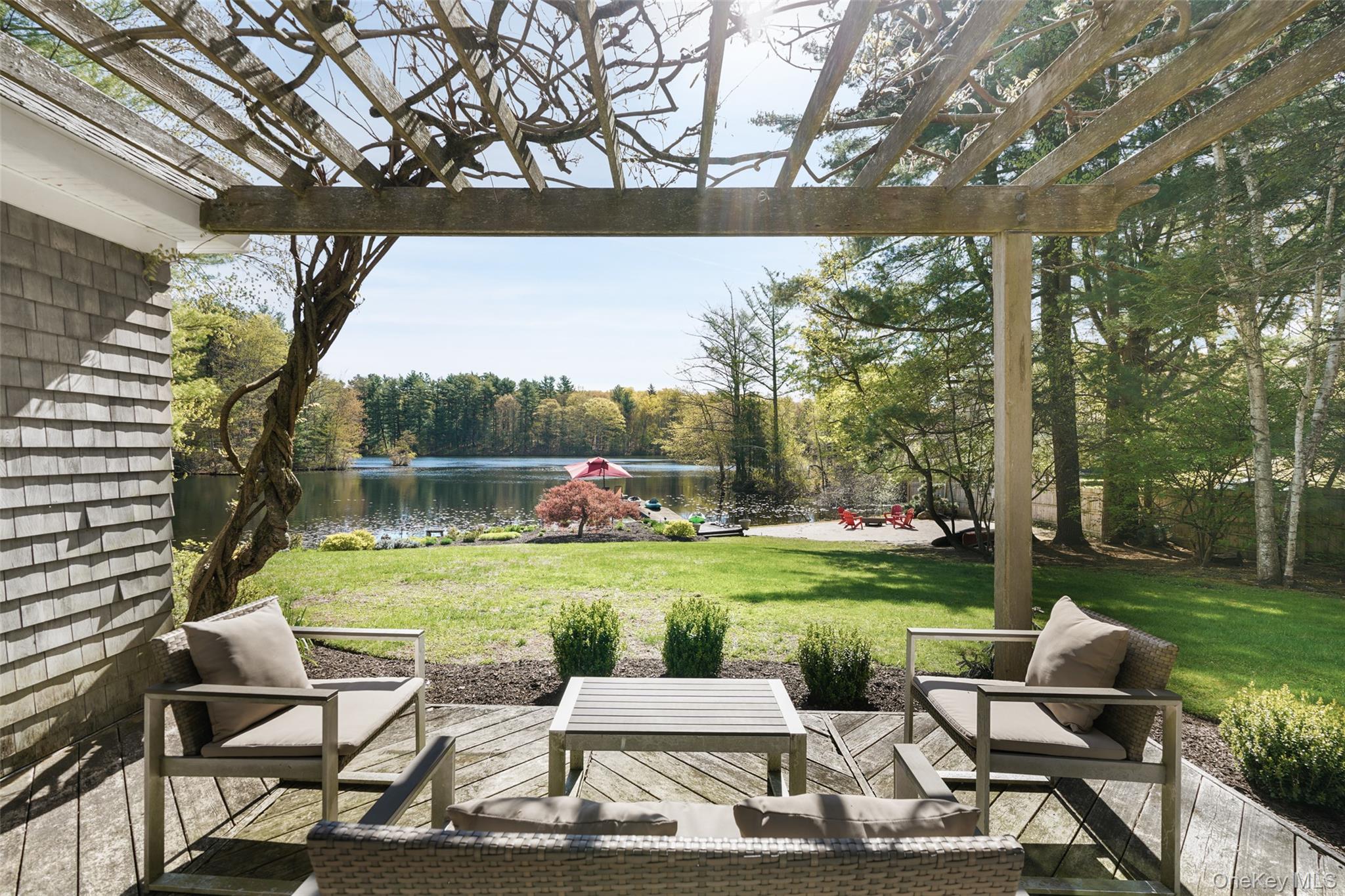 559 Pound Ridge Road Pound Ridge, NY 10576 - Photo 17 of 21 a patio with a yard table and chairs