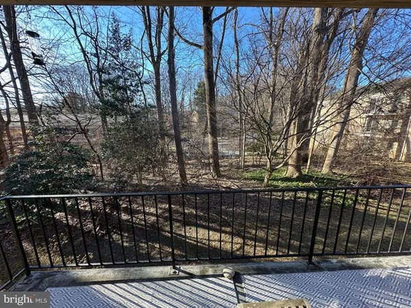 a balcony with wooden floor